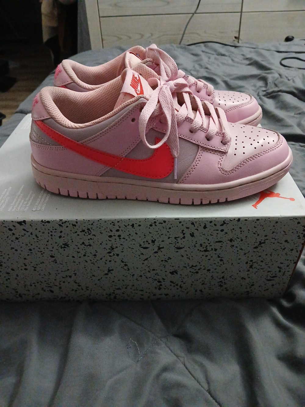 Nike Women’s Low-Top Pink Sneakers with Coral Swoosh